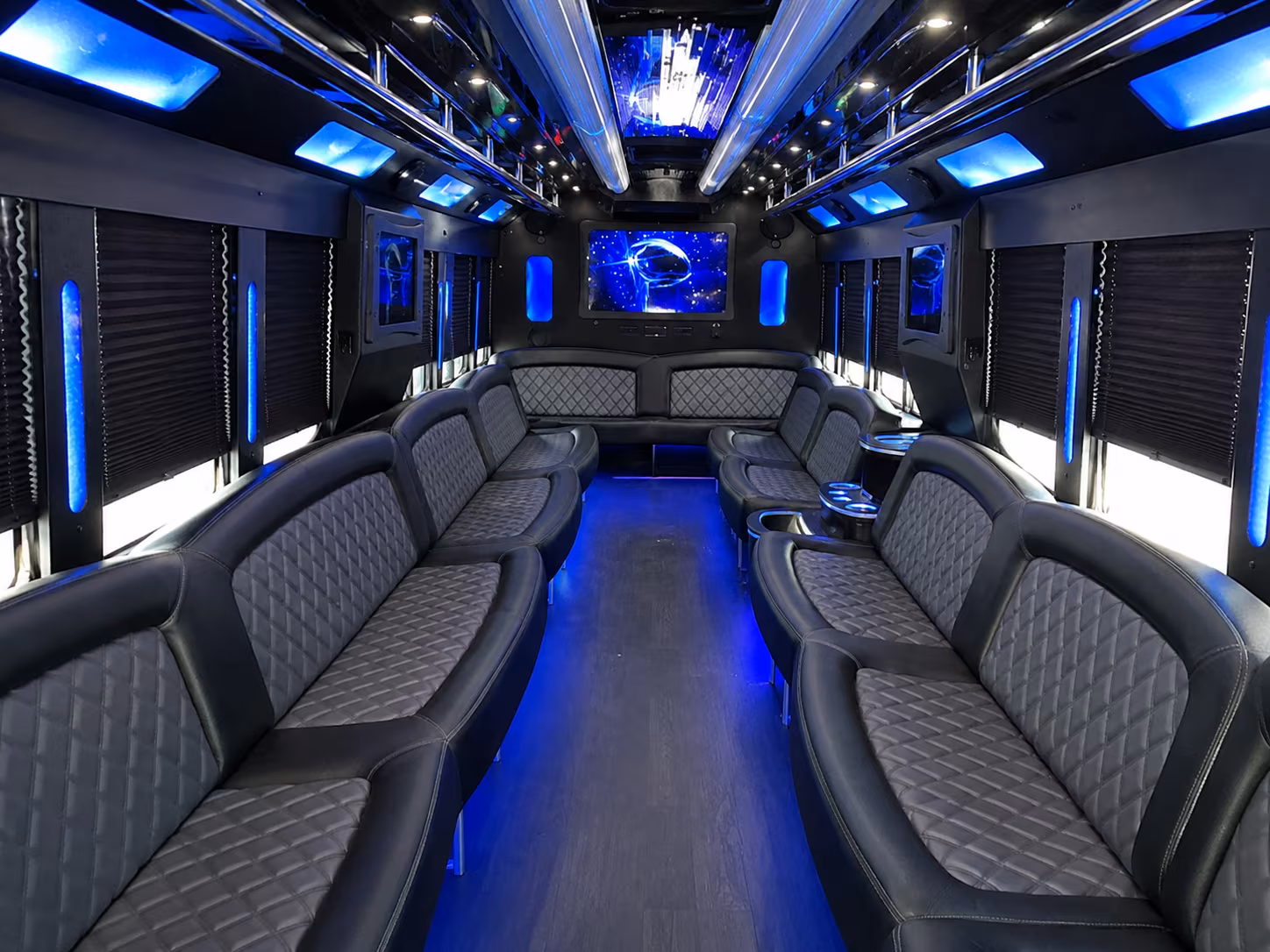 Friends laughing during a party bus celebration in Bridgeport